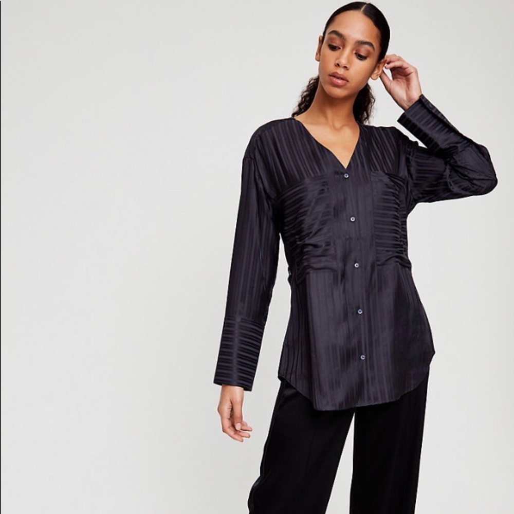 Wilfred Zelie Top